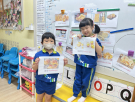3孩子們分享自己吃過的圓形點心.JPG